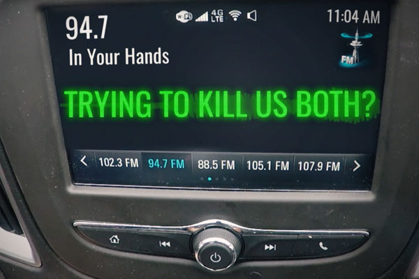 video screen in car with message "are you trying to kill us both?"